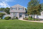 Pack your suit case, and move right in to this turn-key colonial in the heart of Lake Grove Village! Completely remodeled in 2020, this home is everything you need and more. Featuring a center-hall layout with a lovely white-washed brick fireplace with custom granite hearth and matching mantle, an updated Kitchen, updated bathrooms, hardwood floors, custom moldings, 5 year old roof and siding, new composite front deck, all custom closet inserts, newly finished basement with bonus room, and an abundance of storage. The backyard is a generous size, with a custom built-in fire pit area as the focal point. Conveniently located within minutes of shopping, major highways, and the local train station. Don&rsquo;t miss your chance to see this beautiful home.