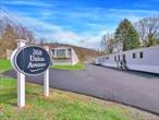 This 2 bedroom single story manufactured home comes with washer / dryer hookup, two assigned parking spaces directly outside the home as well as a small private garden area. Centrally located directly across from Heritage middle school and just 5 minutes from 5 Corners. No dogs allowed.