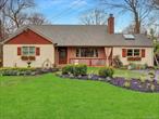 One of a kind custom expanded Cape. High end custom kitchen with Viking Stove and large Granite island with seating.Pendant lighting , brick fireplace, Ingroung pool, heated.Outdoor TV stays, front and back inground sprinklers Tiki Bar, Koi Pond.Beautiful landscaping numerous flowering plants.