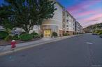 Welcome to The Meridian â€“ a lifestyle of comfort and convenience in the heart of Suffern! This beautifully maintained and recently updated 2-bedroom, 2-bathroom condo offers the perfect balance of style, space, and modern living. INTERIOR FEATURES: Step inside to an inviting open-concept living and dining area, highlighted by new hardwood floors, crown molding throughout, and abundant natural light. The kitchen shines with new cherry wood cabinetry, granite countertops, a ceramic backsplash, and a generous bar-height pass-through for effortless entertaining. Youâ€™ll also enjoy: New appliances: fridge, stove, dishwasher, and washer/dryer, Updated plumbing and new light fixtures, Freshly painted walls throughout for a modern, move-in ready feel. The primary suite is your private retreat, complete with a walk-in closet and an en-suite bathroom featuring new cabinetry, a double vanity, oversized shower, and elegant ceramic finishes. The second bedroom is ideal for guests, a home office, or a den, with its own full bath nearby. OUTDOOR & COMMUNITY AMENITIES: Step onto your private balcony from the living roomâ€”perfect for morning coffee, evening cocktails, or simply relaxing. As a resident of The Meridian, youâ€™ll enjoy resort-style amenities, including: Swimming pool and sun deck, Fully equipped fitness center, Community room and first-floor garden, Secured storage space on the same floor as the unit, FOB-secured entry and elevator access, Heated underground garage with assigned parking plus outdoor secured lot for a second car, Complimentary EV charging station across the street. LOCATION: Perfectly located, youâ€™ll be just minutes from downtown Suffernâ€™s restaurants, shops, and entertainment, as well as the Historic Lafayette Theater and Thorne Valley Winery. Commuters will love the easy access to NJ Transit trains and buses to NYC, along with major highways.