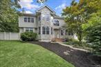 Welcome to 22 Whispering Woods Drive, located in the sought-after Smithtown School District! This beautiful home sits on a .35-acre property and boasts a true resort-style backyard. Step into the two-story entry foyer, where vaulted ceilings and gleaming hardwood floors set the tone for this inviting home. The young, updated chefâ€™s kitchen is a true showstopper, offering plenty of counter space, a wine and coffee bar, and views of the stunning yard. Sliders off the kitchen lead to a paver patio, making summer barbecues easy and enjoyable. The yard is an entertainerâ€™s dream, featuring a sparkling inground pool with a new liner and heater, plus a relaxing hot tub. The first-floor sitting room is the perfect place to unwind with a good book or can double as a home office. The thoughtful floor plan allows seamless entertaining between the living room, den, and kitchen, while the spacious dining room is ideal for hosting holiday gatherings. Upstairs, youâ€™ll find generously sized bedrooms, creating a private retreat for rest and relaxation. The full basement offers additional living space, perfect for a play area, home gym, or theater. Additional highlights include: Updated roof and hot water system, 150 Amp electric service, LED high hats throughout, Precast cesspool, Hardwood floors throughout. This home blends style, function, and outdoor living for the ultimate lifestyle experience!