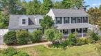 A stunning colonial with over an acre of level property located in a wonderful neighborhood.... The main level consists of a living room with a wood burning fireplace, sitting room, dining room, eat in kitchen with a breakfast area,  a full bath and a newly added three season room.  The upper level provides a primary bedroom with large closets along with a full primary bath. 3 additional sizable bedrooms and a large finished bonus room which can be used as office, gym or even a recreation room complete the upper level. The outdoor amenities include a covered front porch, back deck, a beautiful 3 season room, fenced in yard and a green house for your gardening needs.  An oversized two car garage, long driveway, close proximity to I-87 just adds more value to this home.  Feel confident as the roof and windows were recently replaced along with many other items that make this home complete. This home was well cared and it shows....