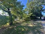 Prime development opportunity on an irregular 3, 700 sq. ft. corner lot with approved BSA variance to build a custom single-family residence with a garage. Plans allow for approximately 3, 413 sq. ft. of total buildable space across four levels: cellar, first floor, second floor, and atticâ€”offering a rare chance to create a spacious and functional home tailored to modern living. Located between Francis Lewis Boulevard and 24th Road, this property provides excellent accessibility with the Q76 bus and Cross Island Parkway just minutes away. Situated in sought-after District 25, near top-rated schools PS 184 and IS 194, this lot combines location, convenience, and long-term valueâ€”perfect for builders, developers, or end-users looking to design their dream home.