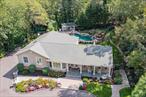 Location, location! Beautifully renovated in 2020, this sprawling ranch features 4/5-bedrooms, 3.5-bathrooms and is located on a quiet and private court in the sought-after Buttonwood section of Dix Hills. Set on .8 acres of manicured property, this home blends modern updates with a serene lifestyle setting.Inside, youâ€™ll find hardwood floors with a rich walnut stain, spacious living areas, and a gorgeous 5 year old chefâ€™s kitchen with custom cabinetry, a large center island, quartz countertops, a La Cornue stove (like Joanna Gaines!), Bosch appliances and a fabulous pantry â€” perfect for entertaining and everyday living. The open dining and living spaces are filled with natural light and flow seamlessly for gatherings both large and small. The beautiful office with French door and picture window is the perfect setting to get your work done in. The primary suite offers a private retreat with vaulted ceilings, ensuite bathroom & walk-in-closet, complemented by updated bathrooms throughout the home. The fully finished basement expands the living space with a den/media room, playroom with lots of closets, home gym, office/guest room, laundry, plus a crawl space for abundant storage. The home is equipped with a 200-amp electric panel for peace of mind.Step outside to your own private resort. The backyard boasts a heated in-ground, salt-water, gunite pool, hot tub, and cascading waterfall feature framed by vibrant landscaping. A charming pool house with covered seating and an outdoor kitchen area create the perfect setting for summer entertaining. There is an elevated turf playground area (playground not included) and down below you will find an outdoor fireplace and a firepit area with a golfing net! The expansive patio and lush yard provide endless opportunities for recreation and relaxation. Let us not forget that there is also a turf dog-run right out the side door of the kitchen for your furry friends. This rare ranch offers luxury living on a private cul-de-sac in one of Dix Hillsâ€™ most desirable neighborhoods â€” a true move-in ready gem. Sprinklers front and back. Boiler 3 zones 15 years, CAC 5 Years, Natural Gas, Cesspool pumped 2 years ago, Security System, Washer and Dryer 2 years, Kitchen and appliances 5 years, Some windows 5 years. Sonos Sound System, Filtered Water in kitchen faucet, 200 Amp. HHH Vanderbilt, Candlewood, HHH West.