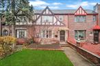 Classic English Tudor-style home for rent in the heart of Forest Hills. The first floor offers a formal living room, dining room, entry foyer, kitchen, and half bath. The second floor features 3 bedrooms and 1 full bath. A finished basement adds versatility with additional rooms and another full bath. Enjoy a private backyard, 1-car garage, driveway, and easy street parking in a quiet residential neighborhood. Conveniently located near public transportation, shopping, and dining. Tenant pays all utilities.