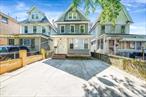 A Rare Gem in Elmhurst! This spacious 2.75-story two-family home combines comfort, style, and versatility. The first floor features two bedrooms, a full bath, an eat-in kitchen, living room, and a mudroom with direct backyard access.The second floor shines with custom kitchen cabinetry, ceramic flooring, and a remodeled full bath, plus bedrooms with custom built-in cabinetry. A duplex level adds two more bedrooms, office and another bathâ€” extra living space for everyone. Additional highlights include a private driveway for two cars, a full finished basement with outside entrance, bath, laundry, boiler room, and flexible recreational space, and 3 electric meters and 2 gas meters. Conveniently located near shopping, schools, parks, and public transitâ€”with easy access to Manhattan and the Long Island Expresswayâ€”this home is a standout opportunity for owners or investors alike. Low Taxes!!