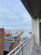 Offered for sale with tenant in place. Call for rental information. Luxurious Opulence! A step above the rest 4J, in The acclaimed Accolade Condominium, is an exquisite 1238 sf, 1 Br/1.5 Bth home with a private covered patio, CAC (Nest), Full sized, in-room W/D, WIC&rsquo;s, parking + more. The design and finishes are like none other. Step into a gracious foyer which keeps the rest of the apartment out of view for deliveries. The beautifully maintained Porcelain floors start here and extend throughout the main living area and kitchen. One LR wall has Fleur-de-lis plaster texture to compliment the bright flooring. One LR wall is all glass with windows and patio doors; electric blinds are installed. The kitchen w/wood cabinetry has custom South American Granite counters, Marble Subway tile backsplash, SS appliances and an island w/storage. The King size MBr has refinished solid wood floors and a separate door to the patio. The en-suite bath has a double vanity and separate commode, shower & jacuzzi soaker. The 1/2 bath has a damask-textured wall paper and delicate finishes. Chandeliers are throughout the home and motorized Hunter-Douglas window shades cover every window including the patio door. Included in the building is a natural light gym and a lounge/party room (both with Wifi), cable TV and table console games. Located in a gated community 5 minutes walk to the NYC fast Ferry to mid-town or the free SI ferry to FIDI. The community includes EV chargers, Tennis/Pickle Ball Courts, 24 hour patrolling security, BBQ areas, great lawns, a large dog run and so much more..Call today for an appointment.