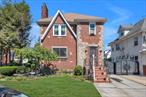 Step into Tudor fairytale living in the heart of Flushing!Nestled on a 40?&#215;?100?ft lot, this enchanting Tudor mash-up of vintage character and modern living spans 2, 760?sq?ft across 4 bedrooms and 3 full baths. Fully finished attic and basement? You got itâ€”ideal for a home office, studio, or dream bonus room.Location? Unbeatable!!