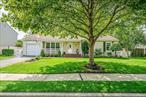 Welcome to this beautifully updated 3 bedroom ranch in the College Woods section of Central Islip. A welcoming front porch opens to an airy layout filled with large, bright rooms. The kitchen features granite counters and gas cooking. Gas heat and central air ensure year-round comfort. Recent updates include a newer roof, windows, and gutters. The beautifully landscaped yard is perfect for relaxing, and entertaining. The full finished basement offers flexible space for recreation, and home office. Conveniently located near schools, shopping, and transportation, this move-in ready home is a must-see!
