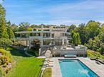 A MODERN MASTERPIECE - Impressive and dramatic with soaring ceilings, phenomenal light and artistic angles. Impeccably appointed 10, 000 square feet with beautifully proportioned roomsâ€”perfect for entertaining on the grand scale. Incredible Atrium Entry. Stunning Living Room with herringbone oak floor, massive stone-faced fireplace and tiger maple built-in with wet bar. Library with Fireplace. Dining Room with dramatic curved wall. Poggenpohl gourmet Kitchen with Sitting Area with fireplace. Private Primary and Guest Suites. Four additional Bedroom Suites. Playroom. Billiard Room. Nearly twelve acres, on two parcels, in one of Pound Ridge&rsquo;s established estate areas. Incredible landscaping with dramatic rock outcroppings and exquisite plantings--majestic Oak, Kousa Dogwoods, Weeping Cherry, Sugar Maple, Plum, Blue Cedar, Crabapple, Burning Bush and Viburnum. Wrap-around terraces and decks overlook the Pool and Tennis Court. Spectacular architect-designed Pool House for the ultimate entertaining experience.