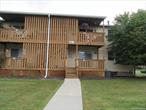 Excellent FIRST FLOOR condo with HOT WATER INCLUDED. This spacious condo is in the conveniently located in the Weathervane Condominium development. Just painted, new hardwood floors. Large living room, ample dining area as well as breakfast bar. Bedroom with two closets, one of which is walk in. Great deck to relax on. Direct access via staircase to unit&rsquo;s own basement with tons of storage space, as well as an area that can be used as a playroom, den, office, workout room, with new carpeting just installed. Dedicated parking space right outside the door. Washer/dryer located in basement which can also be accessed from the common hallway. Great amenities: pool, clubhouse, basketball, tennis, tot lot.