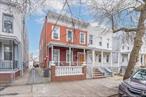 Two family home in a quiet street walking distance to public transportation, schools, house of worship, supermarket .