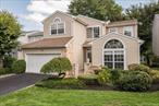 Welcome to 45 Hamlet Drive, nestled within the exclusive 24-hour gated community of The Hamlet at Wind Watch in Hauppauge, NY. This highly desirable Carlisle model boasts a spacious first-floor primary bedroom suite complete with two walk-in closets and a bathroom featuring double sinks, a shower, and a tub. The home&rsquo;s stunning double-story entry welcomes you with cathedral ceilings leading to a large family room with a cozy gas fireplace. The open-concept kitchen, equipped with a butler&rsquo;s pantry, is perfect for entertaining. Upstairs, you&rsquo;ll find three generously sized bedrooms and a full bath. Relax in the serene backyard with a built-in BBQ, paver patio, and captivating golf course views. Large 2 Car Garage. Updated Alarm System. A/C, Heating system and HWH replaced. Donâ€™t miss this gem!