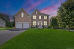 Welcome to this stunning contemporary Colonial straight out of the pages of Town & Country magazine! This beautifully crafted Toll Brothers The Ellsworth model home sits on a corner lot, at the entrance of a quiet cul-de-sac. It features an open-concept design with rich hardwood floors throughout. Enjoy morning coffee while taking in beautiful mountain views in the sunlit breakfast nook or on the deck. The gourmet kitchen, ideal for everyday living or holiday gatherings, flowing seamlessly into an elegant and inviting family roomâ€”perfect for movie night. A private office/den on the main level allows you to work remotely everyday. Upstairs, the spacious primary en suite offers two walk-in closets and a cozy sitting areaâ€”perfect for a 2nd office or personal retreat. Every bedroom has custom-designed, built-in closet systems that help keep each room clutter free. This amazing home is located in the sought-after Four Corners Development, with top-tier amenities including a pool, 2 playgrounds, tennis/pickleball courts, basketball courts, and walking trails. With a Generac whole-house generator, an irrigation system, and no updates needed since its 2017 build, this home is move-in readyâ€”just pack your bags and enjoy resort style living that only the Four Corners Development can offer!