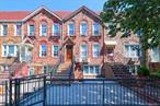 Welcome to this attached brick three-family home in the heart of Sheepshead Bayâ€”currently utilized as a two-family residence. The layout features two stories over a walk-in entry, with the walk-in and main floor arranged as a duplex: a spacious living room, kitchen, dining area, and full bathroom downstairs, accompanied by three bedrooms and another full bath upstairs. The top floor presents a self-contained one-bedroom apartment with its own living room, kitchen, dining area, and full bathroom. Convenience is enhanced by an in-unit laundry area with a washer and dryer, a generous backyard perfect for entertaining or relaxation, a double garage, and a shared community driveway. Building 18x40 over 18x100 lot. Located just minutes from major transit options, this property offers excellent connectivity: bus lines B3, B36, B44, and BM4 serve nearby stops, while subway access to the B and Q trains ensures easy commutes throughout Brooklyn and into Manhattan.