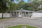 Welcome to 7 Pine Tree Drive, a cozy and stylish 3-bedroom, 2-bathroom ranch tucked away on a quiet dead-end street in Shirley. Completely renovated in 2017, the home features a new roof, kitchen, bathrooms, floors, recessed lighting, and washer/dryer, plus solar panels that help keep monthly utility costs super low, giving you both peace of mind and savings from day one. From the moment you enter, youâ€™re greeted by an open-concept layout where the living room and kitchen flow effortlessly together. Vaulted ceilings, skylights, bay windows, and recessed lighting fill the space with an abundance of light, giving the home a bright, airy feel thatâ€™s both modern and welcoming.The kitchen is a standout feature, complete with white shaker cabinets, nickel hardware, granite countertops, a contrasting center island, and stainless steel appliances, including a gas range perfect for cooking, entertaining, or just enjoying your morning coffee. The primary suite offers a spacious retreat with an en-suite bath that includes a walk-in shower accented by natural stone and sleek tilework. The additional bedrooms are cozy and well-proportioned, and the second bathroom is crisp and clean with subway tiles, tub, and modern finishes.Step outside to a fully fenced backyard with brand new PVC fencing, a detached garage, and a patio space ready for outdoor dining or relaxing. The U-shaped driveway in front offers plenty of off-street parking for guests or extra vehicles. You&rsquo;re just minutes from Shirley Beach, Smithâ€™s Point Beach and close to parks, shops, and highways. With nearby revitalization projects, including the new Smith Point bridge, thereâ€™s also strong potential for future value.