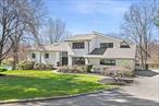 Experience luxury living in this newly fully renovated, turn-key home set on the prestigious Round Hill Rd in Armonk, with the added bonus of the opportunity of joining the Windmill Club. Boasting an expansive open floor plan, large rooms, vaulted ceilings, wide planked white oak hardwood floors, this designer inspired home is filled w/ high end finishes throughout. The large open living room & family room, with vaulted ceilings and free standing, two-sided gas fireplace leads into the most elegant chef&rsquo;s kitchen, fully equipped with stainless steel Thermador appliances (including Thermador Professional Range), quartz countertops, 8 ft. center island and more. The mudroom, with its outfitted cubbies, is situated conveniently to the large 2-car garage and driveway. The formal dining room, with its elegant chandelier and transitional partition; and stunning powder room with a floating vanity and white oak acoustic modern paneling add beauty and uniqueness of the first floor. The primary bedroom ensuite will dazzle you with a vaulted ceiling, spacious, elegantly customized walk-in closets (withe self-closing barn doors), private deck off the bedroom, and a glorious well appointed bathroom with heated floor, stunning cabinetry, deep oversize free standing tub, oversized shower, with digital smart water faucets and shower displays, smart heated toilet, and heated towel bar. Three additional generous sized bedrooms, with custom outfitted closets, and exquisitely designed full bathroom with waterfall faucet, LED mirror and glass enclosed shower, complete the second floor. The basement includes large recreation spaces, a full laundry room with new washer/dryer, farm sink, butcher block countertop, cabinetry and work space, full bathroom, office/den, utility room with 2 new furnaces, new water heater, new vents, new smart thermostats, generator, and lots of storage. The newly renovated maintenance-free deck, spanning across the back of the home, is a perfect spot for entertaining, and enjoying an expansive park -like backyard, including a private in-ground heated pool with pool shed (New pump and filter installed in pool July 2025). In addition to the amazing features of this home, you have the opportunity to join the Windmill Club, as home comes with the MEC, offering many amenities, including a beach, lake for swimming, clubhouse and tennis.