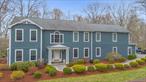 Welcome to your dream home in the sought-after Town of Southeast, proudly served by the Brewster School District! This exceptional residence is designed for comfort, convenience, and elegance, offering not one, but two luxurious primary bedroom suites. The expanded main suite feels like a private retreat with a cozy sitting area, a sunlit balcony, a spa-inspired bath with dual sinks, a soaking tub, a separate shower, and a custom walk-in closet. A second suite is perfect for guests or extended family, complete with its own walk-in closet, soaking tub, and walk-in shower. At the heart of the home sits a granite kitchen with stainless steel appliances, breakfast nook, and seamless flow to a Trex deck with new railing, perfect for morning coffee or evening gatherings. The spacious layout continues with a formal dining room, family room, den, and a living room warmed by a fireplace. A dedicated mudroom/laundry area and a spotless two-car garage add everyday practicality. The semi-finished walk-out basement offers endless versatility, ideal for a home office, gym, or playroom, while the beautifully landscaped, level backyard with flowering trees, patio, and mature greenery provides the perfect setting for outdoor enjoyment. Modern comforts include central air, a whole-house generator, security system with cameras, and dual Ring doorbells. Set on a quiet cul-de-sac, the property is just minutes to Metro-North, I-684, scenic reservoirs, hiking trails, and local parks and fields. A rare opportunity in Southeast, where space, style, and location all come together in perfect harmony. Donâ€™t miss this one!