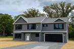 Welcome to Bigert Drive, a beautifully crafted new construction colonial home offering 4 spacious bedrooms and 2.5 baths. Nestled in a desirable neighborhood in the Goshen Central School District, this home combines modern craftsmanship with timeless style, creating the perfect blend of comfort, quality, and functionality. Conveniently located near major highways for easy commute and proximity to shopping. Step inside to find an open and inviting layout, thoughtfully designed with todayâ€™s lifestyle in mind. The living room centers around a natural gas fireplace offering warmth and charm throughout the seasons. The heart of the home is the custom kitchen, designed to match the architectural plans and tailored with cabinets, stone countertops, and high-quality faucets. Bathrooms also feature matching vanities with stone tops, stylish fixtures, and durable finishes. Every detail has been carefully selected to strike a balance between beauty and practicality. The primary suite is a luxurious retreat, complete with a spa-inspired bathroom showcasing a pedestal soaking tub, tile shower, and a double vanity. The 3 additional bedrooms are generously sized, offering plenty of storage and natural light. Interior highlights include colonial-style raised panel doors, 3â€ craftsman-style casings, 5â€ colonial-style base molding, oak railings with metal spindles, and neutral wall colors that provide a fresh, modern backdrop for your decor. This home is built for comfort year-round with 2-zone natural gas-fired heat and two-zone central air conditioning. A 200-amp electrical service supports all modern needs, with cable, phone outlets, smoke and carbon monoxide detectors, and a garage heat sensor for safety. The stamped concrete front porch with vinyl railings welcomes you home, while maintenance-free vinyl siding, architectural shingles, and standing seam metal accents on the porch areas ensure lasting protection and modern curb appeal. Energy-efficient double-hung windows with grilles between glass provide natural light and easy cleaning while framing beautiful views of the neighboring horse farm. Imagine sipping your morning coffee while watching the horses graze. The backyard is accessible via a sliding patio door, and outdoor features include a paved driveway, stamped concrete patios, a seeded yard, and frost-free hose bibs with exterior outlets for convenience. Municipal water service and a private septic system complete the package. This exceptional new construction home offers quality craftsmanship, modern amenities, and timeless style. With opportunities to personalize finishes, you can create the home of your dreams in a sought-after Hudson Valley location.