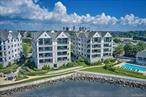 This is more than a home -- it&rsquo;s your personal waterfront sanctuary. Perched atop New Rochelle&rsquo;s most exclusive gated community, this breathtaking penthouse delivers sweeping views of the Long Island Sound, New Rochelle Harbor, and Throgs Neck Bay from nearly every room. Step into a sun-drenched great room with soaring 15&rsquo; ceilings and walls of glass that blur the line between indoors and out. Slide open the doors to your 30-foot covered terrace, ideal for sunset cocktails, weekend grilling, or simply soaking in the serenity. Inside, the chef&rsquo;s kitchen is a showstopper -- sleek, spacious, and ready for your next culinary adventure. The primary suite is pure indulgence, with three walk-in closets and a spa-inspired bath that invites you to unwind. Two additional ensuite bedrooms offer comfort and privacy for guests and family. Resort-style community amenities include an elegant clubhouse with fireplace, bar and lounge, a fitness center with panoramic water views, a heated outdoor pool and private beach, lush walking paths, a tranquil gazebo, and pristine grounds. Just 35 minutes from Manhattan, with two indoor garage spaces and a private storage room, this residence blends luxury, convenience, and coastal charm. Your front-row seat to waterfront living awaits. Come home to the view, the vibe, and the lifestyle you&rsquo;ve been dreaming of.