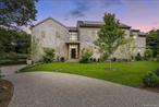 Located in Water Mill, South of the Highway, with access to Mecox Bay, on a coveted, private lane, this luminous, new shingle-style construction features 6 bedrooms, 6.5 baths and 2 fireplaces across 5, 400+ sf of living space. A light-filled entry leads to an open, spacious living room in a home featuring modern Asian decor. Five ample sliding glass doors open directly to the bluestone back patio, a heated gunite 20x40 pool, and a beautifully-landscaped backyard. The home also offers 2 primary suites with separate showers and soaking tubs, 4 ensuite bedrooms, including one with its own private entrance and patio. On the second floor, there are a library/meditation room and a private office space. The ground floor includes a recreation room with a ping-pong table and one bay within the 2-car attached garage. Additional amenities include multiple outdoor areas for dining and entertaining, a gas-fired grill, a covered loggia, outdoor shower, and solar panels with backup electric storage. Just a few hundred feet down the road is water access to Hayground Cove and Mecox Bay beyond, perfect for kayaking, canoeing, or paddle boarding.The pristine Flying Point Beach is just a short distance away on the quiet back roads of quaint Water Mill.