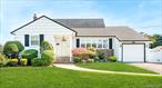Pride of ownership shines through this spacious & well maintained 5-Bedroom, 2-Bath modified Ranch in the Plainedge School District. The First Floor features a Primary Bedroom along with two additional Bedrooms, a Full Bathroom, Living room, Formal Dining Room, and an Eat-In-Kitchen with a side door that opens to a Covered Patio. There is an abundance of Natural Light and Hardwood Floors (under carpeting) throughout the warm and inviting layout of the First Floor. Upstairs, you will find Two spacious Bedrooms with Large Closets and a Full Bathroom, providing plenty of space for guests or an in-law suite. The Fully Finished Basement has an outside entrance with Bilco Doors, Utilities and a Workshop area. The property also has a Fully Fenced Yard with Inground Sprinklers. Additional highlights include a 1-Car attached Garage and pull-down Attic for extra storage. Located in close proximity to schools, shops, restaurants, parks and public transportation.