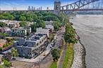 One of Only 2 Top-Floor Homes Remaining â€“ A Rare Waterfront Opportunity. Experience the epitome of luxury living at Unit 3C, a premier townhome-style condo at The Aristo, Astoriaâ€™s most coveted waterfront residence. Designed for both entertaining and relaxation, the expansive living space is enhanced by floor-to-ceiling sliding glass doors that seamlessly connect to your private balcony, where sweeping water and city views create a breathtaking backdrop.The chefâ€™s kitchen is a true showpiece, featuring marble countertops and backsplash, custom cabinetry, and premium appliances including a Bertazzoni stove, Liebherr refrigerator, and dishwasher. Whether preparing a gourmet meal or hosting guests, this elegant space elevates every occasion.The serene primary bedroom offers a spacious closet, a spa-like en-suite bath with Porcelanosa tiles, and access to a private balcony for quiet mornings or evening relaxation. A generous second bedroom with ample closet space provides versatility for guests, a home office, or personal retreat.For the ultimate outdoor escape, ascend to your private 518 SF roof deck, a true urban sanctuary with panoramic city and waterfront viewsâ€”perfect for sunset entertaining or peaceful solitude.Additional highlights include oak wood flooring, 8-foot doors, built-in Vessel Bluetooth speakers, Ring doorbell camera, Brinks security wiring, and washer/dryer hookup. Every detail balances modern convenience with timeless luxury.With on-site parking available (prewired for EV charging) and a beautifully designed common area, The Aristo combines sophistication with community. Its prime location provides effortless access to the N/W subway, while Astoria Parkâ€”with its expansive green spaces, pool, tennis courts, and waterfront trailsâ€”becomes your backyard retreat.The complete offering terms are in an offering plan available from sponsor. File No.CD24-0044. All measurements and dimensions are approximate and are subject to normal construction variances and tolerances and may vary from floor to floor. Sponsor reserves the right to make changes in accordance with the terms of the offering plan. All images are artistâ€™s renderings for representational purposes only and are subject to variances. Though information is believed to be correct, it is presented subject to error, omissions, changes and withdrawal without notice. Equal Housing Opportunity.