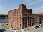 Striking Industrial Modern Living on Troyâ€™s WaterfrontWelcome to the newest addition to downtown Troyâ€™s vibrant sceneâ€”an industrial modern apartment building that blends historic character with contemporary convenience. Oversized industrial factory windows frame sweeping waterfront views, while exposed brick and clean modern finishes create a perfect mix of warmth and edge.Inside, each thoughtfully designed 2-bedroom, 1-bath residence offers an airy open layout with central A/C, dishwasher and stainless steel appliances, and access to washer/dryer on every floor. High ceilings and abundant natural light enhance the sense of space, while sleek modern touches complement the buildingâ€™s industrial bones.Residents enjoy premium amenities including a gym studio, elevator access throughout, and easy everyday living in a building designed for comfort and style.Set in the heart of downtown Troy, this prime location places you just steps from award-winning restaurants, coffee shops, galleries, and the popular farmersâ€™ market. With the Hudson River as your backdrop and Albany only minutes away, youâ€™ll enjoy the best of urban convenience in a setting rich with history and charm.