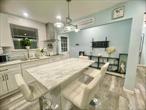 Fresh, move-in ready apartment in North Bay Shore (Town of Islip) with an open-concept living area and a sleek eat-in kitchenâ€”shaker cabinetry, full-height backsplash, vented hood and an oversized island. Modern bath, recessed lighting, and durable luxury-vinyl floors throughout. Exceptional value compared with nearby Village studiosâ€”more space and nicer finishes for a similar budget. Utilities included. Street parking. No pets. Minutes to Bay Shore Village, beaches, shopping/dining, and Sunrise Hwy/Sagtikos/LIRR. Available by appointment. All info deemed reliable but not guaranteed; tenant to verify.