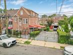 Solid 2-Family home here. Top floor is a 1-bedroom apartment and a 2 bedroom duplex apartment on walk-in level. Included in sale is the adjacent 25x95 lot. R4 zoning.