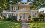 Welcome to this grand Mother/Daughter Victorian house that is situated in the heart of Malverneâ€™s charming Village.  This home features 7 bedrooms 3 full baths. Step into the entrance foyer, the inviting glistening hardwood floors lead to a 10-seater formal dining room and a spacious living room with woodburning fireplace. The first floor features a kitchen with granite counter top a sitting room, a full bath and two bedrooms (one used as an office). In addition, there is a first floor outside entrance to the private patio. The second-floor features three spacious bedrooms and a full bathroom, and an extra kitchen for Mom. In addition, the second-floor fenced balcony overlooks the beautiful and manicured private side yard and two car garage with a 6 cars driveway. There is more. This home also offers a third floor with two bedrooms and an additional office space or computer room. Finally, the open space basement with an outside entrance to the private patio is ready to welcome family gathering and game sessions, a gym room and private laundry room. This home also offers crown molding, lots of storage closets, fairly new boilers. This is truly a one of a kind must see home that is closed to local shops, parks, neighborhood schools, & LIRR access.