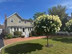 Welcome home to this recently renovated charming colonial, perfectly situated on a quiet street just moments from vibrant downtown Patchogue Village. Enjoy the convenience of walking to the Fire Island Ferries and Mascot Dock on the Great South Bay. Nearby, across the way, youâ€™ll find the Patchogue Village Beach Club, offering a pool, camp, and activities for village residents. From the primary bedroom, take in beautiful water viewsâ€”all while being outside of a flood zone.Inside, the home features an inviting open floor plan with three spacious bedrooms, two and a half baths, a large living room, den, and a bonus office space. Warmth and ambiance are enhanced by two cozy gas fireplaces, both with remote controls. The fenced-in yard with Trex decking provides plenty of outdoor space to relax or entertain, with additional yard area extending beyond.A true standout is the huge detached garage/workshop/shed, perfect for hobbies, storage, or creative projects. Additional highlights include an in-ground sprinkler system and an oversized wraparound driveway that offers ample parking for multiple vehicles and guests.This is a rare opportunity to enjoy the best of Patchogue Village livingâ€”waterfront charm, modern updates, and an unbeatable location.
