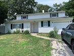 Well maintained 4 Bedroom, 1.5 bath colonial on a corner lot in a lovely quiet neighborhood. EIK, formal dining room, large living room and den with fireplace. 2nd floor has hardwood floors.