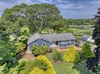 SUMMER 2026! Memorial Day to Labor Day $85, 000 // June $15, 000 // July $30, 000 // August - LD $35, 000 -- Experience the ultimate coastal getaway at this newly renovated Westhampton ranch! This stunning home, freshly updated in 2024, perfectly balances modern comfort with timeless coastal charm. Offering 3 spacious bedrooms and 2 full baths, including a luxurious ensuite master featuring a double vanity, a walk-in shower, and a relaxing soaking tub, it provides everything you need for a serene escape. The open-concept family room and eat-in kitchen are designed for both functionality and style, with beautiful backyard views that create seamless indoor / outdoor living. The gourmet kitchen boasts a large center island with seating for four, stainless steel appliances, and quartz countertops. Enjoy breathtaking views from the unique outdoor space, overlooking Beaverdam Creek. A covered boathouse, two boat slips with direct access to Moriches Bay, and over 100 feet of bulkhead with two floating docks offer endless opportunities for boating, paddle boarding, kayaking, fishing, and more. After a day on the water, unwind in the heated, gunite, in-ground pool, or host gatherings in the expansive yard designed for entertaining. Situated just a mile from Main Street, the home is within close proximity to all local attractions, shops, and restaurants Westhampton Beach has to offer. With its exceptional location and thoughtfully crafted upgrades, this home is the perfect retreat for those seeking a luxurious Hamptons summer. Rental Registration # RP240952