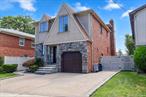 Large Brick Multi Level One Family Home, Fantastic location in Bayside , close to shopping and transportation.5 bedrooms , Living room , Family room, 3 bathrooms .Finished basement. Central AC, 8 zone 2 year old heating system. in ground swimming pool . Large back yard . Excellent condition Home.