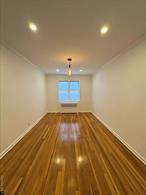 Gut-renovated 2-bedroom, 1-bath co-op featuring 1, 200 sq ft of thoughtfully upgraded living space. Fully updated electrical and plumbing systems, including new electric panel, GFCI protection, USB-C outlets, new shut-off valves, and smart home integration with 26 Wi-Fi-enabled recessed LED lights.Refinished hardwood floors, skim-coated walls with fresh paint, custom crown molding, base trim, and integrated radiator covers throughout. Kitchen features solid white quartz countertops with waterfall edges, large-format porcelain tile, custom white shaker cabinets with soft-close drawers, and premium stainless steel appliances including a 4-door French refrigerator, gas convection range, dishwasher, microwave, and 30â€ undermount sink with commercial-style matte black faucet.Bathroom includes floor-to-ceiling porcelain tile, floating vanity with integrated storage, anti-fog LED mirror, matte black fixtures, rain shower with hand spray, and dual-flush one-piece toilet.Additional upgrades include matte black hardware with Microban antimicrobial finish throughout, decorative pendant lighting, Nest smart home integration (Nest Mini, Nest Audio, Nest Hubs), and modern electrical and lighting updates throughout the home. Located near the Freeport Nautical Mile, shopping, restaurants, parks, and public transportation.Move-in ready.