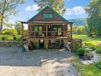 Modern comfort with Rustic Charm. This cabin is in the town of West Fulton in Schoharie County, New York with Middleburgh schools. Welcome to this beautifully maintained log home, offering warmth, character, and thoughtful updates throughout. The kitchen boasts granite counters and a tumbled marble backsplash, while the updated bath, live edge woodwork, and wood floors add timeless appeal. Featuring a spacious loft bedroom, first-floor bedroom, and a full walkout basement with pellet stove, this home is ideal for year-round living or as a peaceful getaway. Upgrades include 2-zone oil heat, newer water heater, water softener, and a 3-year-old metal roof. The heated walkout basement provides endless possibilitiesâ€”family recreation, workshop, or home office. Outdoors, enjoy the cozy front porch, new landscaping with circular driveway, detached shed, and fire pit for evenings under the stars. Snowmobile trails nearby! Just 1 hour to Albany & Cooperstown and 2.5 hours to NYC. A move-in ready retreat where modern comfort meets rustic living.