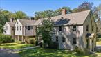 Rare Estate Compound. Surrounded by bucolic countryside, nearly seven acres in an area of foremost country homes and estates. Verdant rolling lawns lined by old stone walls, specimen trees, apple orchard and beautifully flowering shrubs. Rambling Country Colonial, circa 1925, the former home of actor EG Marshall. Completely updated with nicely proportioned rooms, substantial moldings, extensive millwork, hardwood floors and five fireplaces. Formal Living and Dining Rooms both with fireplaces. Warm and inviting Sunroom. Incredible Chefâ€™s Kitchen with high end appliances and Breakfast Area with doors to terrace. Spacious Family Room. Library/Home Office with fireplace. Private Primary Suite with fireplace, Dressing Room and Bath. Five additional Bedrooms, all with en suite Baths. Private terrace and Swimming Pool. Additional outbuildings include a Three Bedroom Cottage, a Two Bedroom Cottage and a Four-Car Garage with One Bedroom Apartment. Greenhouse with Potting Shed and Storage Barn. A rare compound for extended family, staff or income. Incredible opportunity!