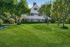 Discover timeless sophistication at 42 Clock Tower Lane, Old Westbury. Designed in 1891 by celebrated architect Stanford White, this distinguished residence was once part of the historic Morgan Estate and rests on more than 3 acres at one of Long Islandâ€™s highest points. Offering 5 bedrooms and 4.5 baths, the home is defined by soaring 10+ foot ceilings, intricate millwork, and eight fireplaces that exude warmth and character. Expansive formal rooms create an elegant yet inviting setting for both intimate gatherings and grand entertaining.At the heart of the home is a gourmet eat-in kitchen, thoughtfully designed with premium finishes and sliding glass doors that open to a covered patio for seamless indoor-outdoor living. A mudroom off the kitchen and driveway features a first-floor washer/dryer, while a second washer/dryer is located in the basement for added convenience. Modern comforts include central air, a whole-house generator, security system, handicap accessibility, and a 2-car garage. Outdoors, the park-like grounds showcase perennial gardens, an estate-size pool with granite patio, and a charming pool house complete with kitchenette, changing room, full bath, and lounge area. A private tennis court completes the resort-like setting. Located within the award-winning Jericho School District, this property is a rare opportunity to enjoy the perfect balance of historic architecture and modern luxury living.