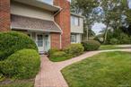 Desirable And well Maintained 2 Bedroom 1 Bath Lower End Unit At The Shores! Great Location! Close to Shopping, Golf And Dining! Special Features Include Tile Flooring, New Stove, New Washer Dryer, New Vanity And New Heat And CAC!