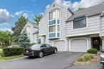 GREAT OPPORTUNITY TO BECOME A HOMEOWNER WITH CLARKSTOWN SCHOOLS. Treetop townhouse with 1, 474 square feet of living space. Two bedrooms plus a large Den, 2 full and 1/2 half bath and Family Room on the lower level with laundry room. The kitchen has been updated with granite counter tops and built-in shelving. Appliances approx. 3 years old. Kitchen has a look thru to dining area which has sliders to an outside deck. Open floor plan to Living Room with brick fireplace and large window making the living area bright and sunny. Entrance area has the half bath and has a double coat closet and one car garage with shelving is also on the main floor. Primary bedroom is large and airy with two double closets and own full bath with walk in shower. The second bedroom is a few steps away with its on access to the second full bath as well as an entrance from the hallway. The large Den has a slider and can be used as an office or room for extra guests. The lower level has a finished Family Room and a separate laundry room with a washer and dryer approx. 3 years old a Culligan water softener and extra storage. EXTRA FEATURES: All Windows except basement has been replaced, HEATING/AC SYSTEM was replaced about 8 years ago, hot water heater (2021) Lower level has a CO/Alarm system that&rsquo;s connected to the upper level, a Water Bug that&rsquo;s also connected to the alarm system,  a Natural Gas detector that&rsquo;s connected directly to O&R, a dust/allergy filtration system, updated electrical panel (220), digital front door lock (keyless), smart app, heating/AC controlled by app.  The Complex has a swimming pool, tennis courts, half basketball court and large playgound. Also a dog walking area is available and dog stations to drop dirty plastic pickup bags. This Townhouse has so much to offer-Must See!