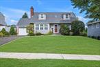 Welcome to this spacious 5-bedroom, 2-bath home located in the heart of Old Bethpage. With room for everyone and a versatile layout, this property offers both comfort and convenience in the sought-after Plainview-Old Bethpage School District. The main level features a bright living room, a functional kitchen with plenty of cabinetry, and a dining area ideal for everyday meals or entertaining. Five well-sized bedrooms provide flexible options for family, guests, or a home office. Two full bathrooms ensure convenience for busy households. The partially finished basement adds even more living space, perfect for a playroom, gym, media room, or storage. Step outside to enjoy a private backyard, a wonderful setting for barbecues, gardening, or simply relaxing. Additional highlights include hardwood floors, ample storage, and a driveway for off-street parking. Close to parks, shopping, dining, and major roadways, this home combines suburban charm with everyday practicality. Donâ€™t miss the opportunity to make 21 Farragut Road your new address in Old Bethpage!
