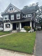 Large one family in amazing location with high potential. Bayswater spacious home currently set-up as a 3 unit. House being sold-as is due to minor fire damage in the attic and in some parts of the home. Situated in a desirable neighborhood, this home is just minutes away from top-rated schools, shopping centers, fine dining, and major highways. Large backyard.