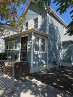 Its Corner property all Updated R3-2 Zoned, Excellent move in conditionClose to 495 and Utioia Pky, Near Park,  shops, Bus Main Street and City1st : Living Room with Fire Place , 1/2 Bth, Kitchen to Back Yard
