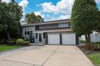 Located mid-block in the Syosset School District, this immaculate, bright and spacious home offers 4 bedrooms, 3 full bathrooms, and a comfortable, functional layout perfect for everyday living.Enjoy gas heating and cooking, a sun-filled interior, a convenient mudroom and foyer, and well-proportioned rooms throughout. The main level features a welcoming living room with lots of natural light and hardwood floors, a large dining area, and a well-appointed kitchen. Each bedroom provides generous closet space. Additional highlights include:â€¢ Attached 2 car garage for convenient parking or storageâ€¢ basement with laundryâ€¢ Private backyard â€” perfect for outdoor relaxation and entertainingâ€¢ Easy access to parks, the LIRR, Syosset Library, shopping, and major roadways