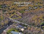 Village of Quogue - 1.25 acre lot for sale. Located in the coveted Stone Creek Area of Quogue off Montauk Highway. Partially wooded. Property backs up to creek and wetlands. Offered as is.