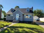 4 BEDROOM RENOVATED HOME...NEW KITCHEN...2 NEW FULL BATHS...HARDWOOD FLOORS...DETACHED GARAGE..PARTIALLY FINISHED BASEMENT