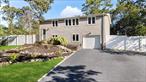 Welcome to 30 Bunny Lane in East Setauket, located in the highly sought-after and award-winning Three Village School District. This beautifully renovated Hi-Ranch style home features three spacious bedrooms and two full bathrooms, offering a perfect blend of modern updates and classic charm. The first floor boasts radiant heated porcelain wood-look tile floors, a stunning new quartz kitchen with coffered ceiling, a cozy wood-burning fireplace, and all-new appliancesâ€”ideal for comfortable living and entertaining.Upstairs, you&rsquo;ll find soaring ceilings, hand-carved bamboo flooring, and a custom-built entertainment wall that creates a perfect gathering space. The primary bedroom includes a generous walk-in closet, and the home is equipped with insulated windows and vinyl shake siding for both comfort and efficiency. Additional updates include a central AC unit (2008), water heater (2017), washer/dryer combo unit (2023), and a new roof (2021). The brand new fenced-in yard provides a safe and private outdoor space, and the attached one-car garage with interior access adds everyday convenience.With thoughtful upgrades throughout and move-in-ready condition, this home truly has it all. Donâ€™t miss your chance to own this beautiful propertyâ€”it wonâ€™t last long!