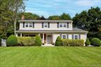 A lovely, spacious colonial tucked in at the end of a secluded court, minutes from Huntington village. The home features all large rooms. Welcoming front porch, large formal living room with expansive front windows fill the home with natural light. The formal dining room off the big bright eat in kitchen; lofted breakfast area surrounded by windows overlooking the backyard, and sliders out to the deck. The large den/great room has a wood-burning fireplace, tray ceiling and 2 skylights; a wonderful space for family gatherings. Upstairs the primary bedroom has an ensuite bath and walk-in closet. There are also 3 more bedrooms and a family bath. Partially finished basement, 2 car garage enters in to the home. Private back yard. Hardwood floors up and down, crown moldings, gas fuel, CAC. Updated Heating System, Home Generator. Newer Windows, Siding & Roof. Enjoy everything Huntington has to offer: great parks and beaches, also endless shopping & dining options, and the LIRR station is nearby. Great location and potential. A forever home to plant roots and grow dreams.