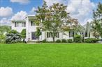 This stunning colonial home, located in a peaceful cul-de-sac in the Forshay area, offers an impressive 6 bedrooms and 4.5 bathrooms on nearly an acre of land. The property features a full, finished walk-out basement and two kitchens, with the first-floor kitchen conveniently adjacent to the dining room and living room, which boasts a cozy fireplace. The first floor also includes one bedroom, a full bathroom, an office, and a half bathroom. The second floor is designed for family living, featuring 4 additional bedrooms, 2 bathrooms, and a laundry area. Outdoor amenities include a basketball court, making this home perfect for both relaxation and recreation, ideal for families seeking a spacious and functional living environment.